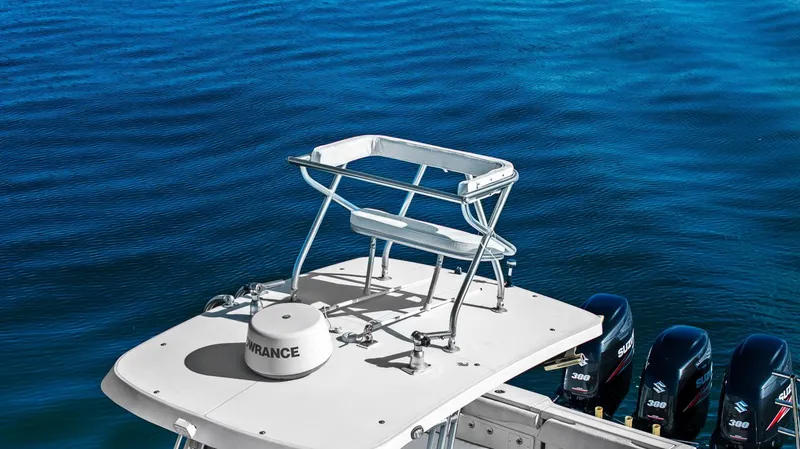  Yacht Photos Pics 2004 Hydra-Sports Vector 3300 CC with triple outboard engines on blue water.