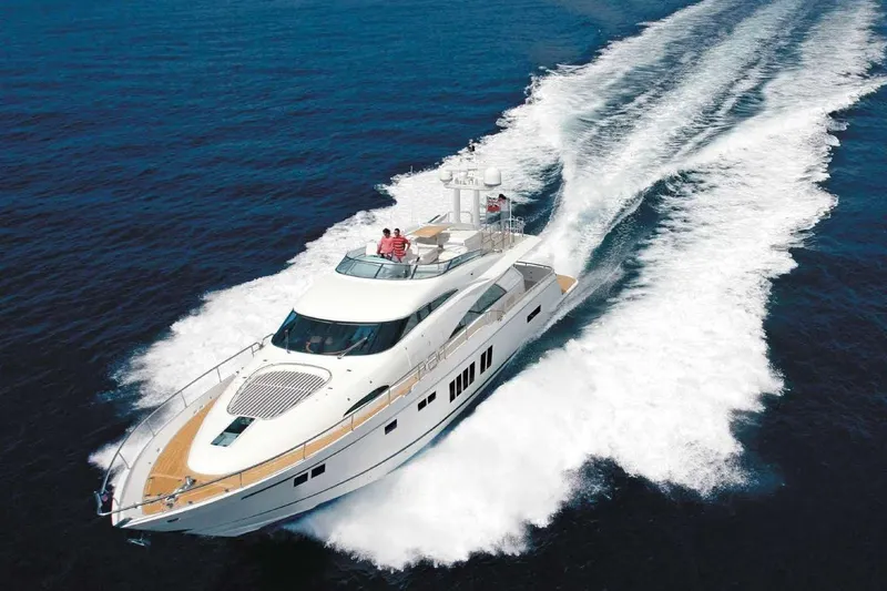  Yacht Photos Pics 2015 Fairline Squadron 78 yacht cruising on open water, creating a dynamic wake.
