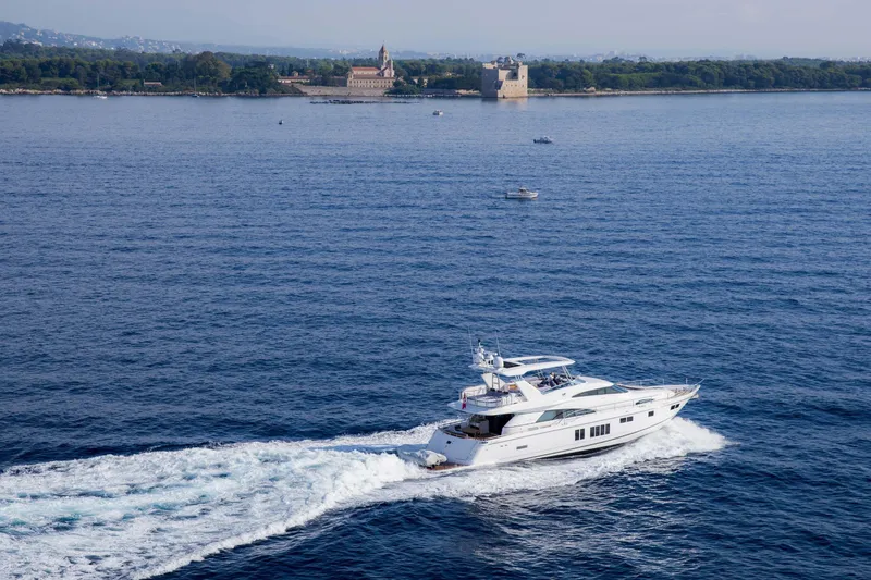  Yacht Photos Pics Luxury Fairline Squadron 78 yacht cruising near scenic coastline, 2015 model.