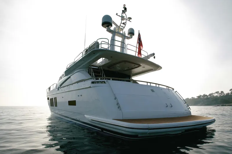  Yacht Photos Pics Luxury Fairline Squadron 78 yacht from 2015 on calm waters at sunset.