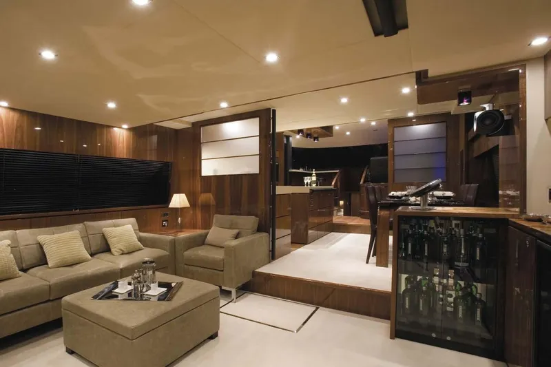  Yacht Photos Pics Luxurious interior of 2015 Fairline Squadron 78 yacht with elegant seating and modern decor.