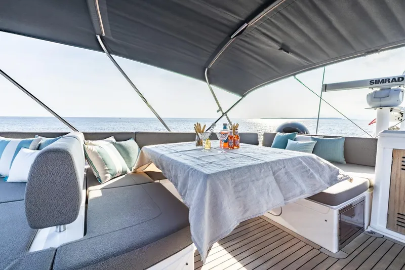 Jam Yacht Photos Pics Luxurious Sunseeker 74 Sport Yacht 2018 interior with elegant seating and ocean view.