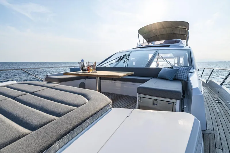 Jam Yacht Photos Pics Luxurious 2018 Sunseeker 74 Sport Yacht deck with seating and ocean view.