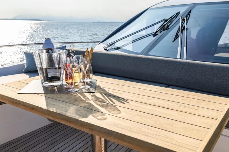 Jam Yacht Photos Pics Luxury Sunseeker 74 Sport Yacht 2018 with elegant outdoor dining setup on deck.