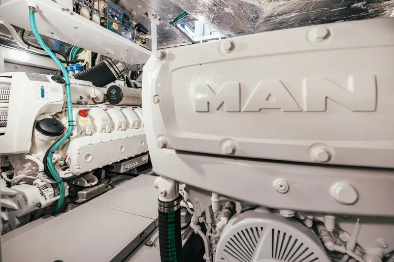 Jam Yacht Photos Pics Engine room of 2018 Sunseeker 74 Sport Yacht featuring MAN engine components.