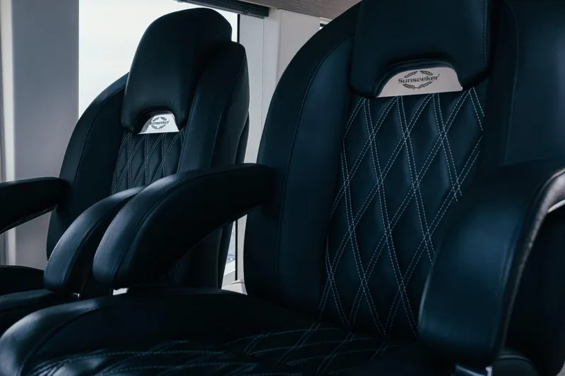 Jam Yacht Photos Pics Luxurious black leather seats in 2018 Sunseeker 74 Sport Yacht interior.
