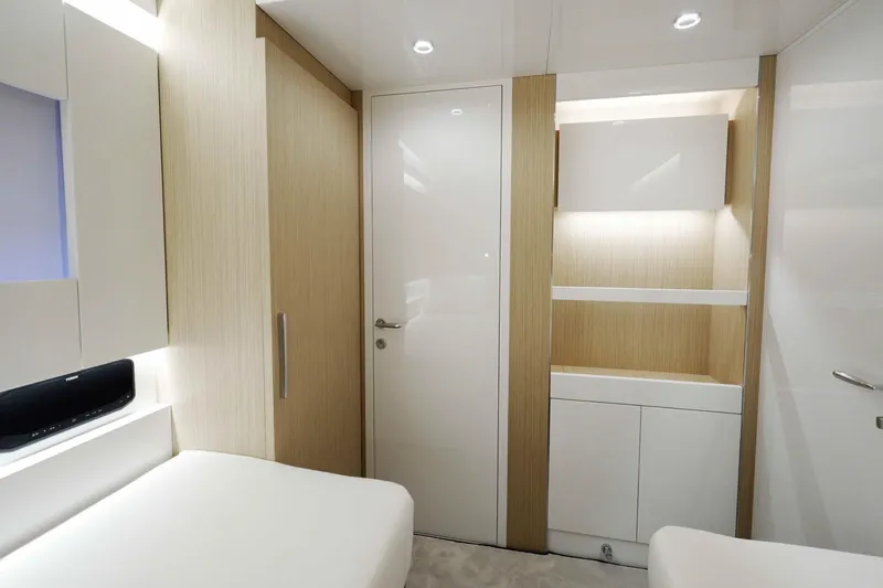  Yacht Photos Pics Luxurious interior of 2024 Arcadia Yachts A85, featuring modern design and elegant wood accents.