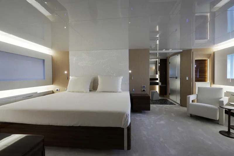  Yacht Photos Pics Luxurious bedroom interior of 2024 Arcadia Yachts A85, featuring modern design and elegant furnishings.
