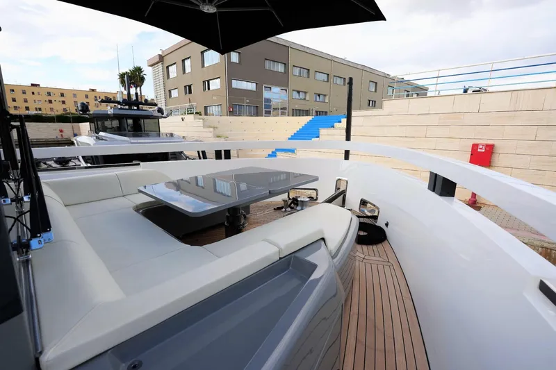  Yacht Photos Pics Luxurious 2024 Arcadia Yachts A85 with elegant deck seating and modern design.