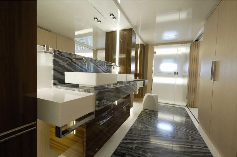  Yacht Photos Pics Luxurious bathroom interior of 2024 Arcadia Yachts A85, featuring modern design and elegant finishes.