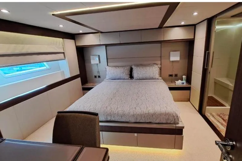  Yacht Photos Pics Luxurious bedroom interior of 2018 Gulf Craft Majesty 62 yacht with modern design.