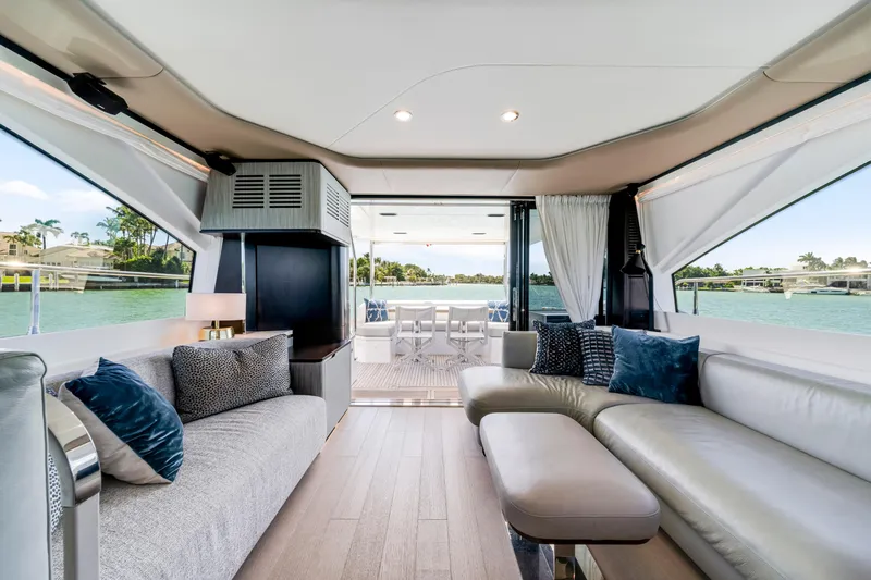  Yacht Photos Pics Luxurious interior of 2020 Azimut 60 Fly yacht with elegant seating and scenic water views.