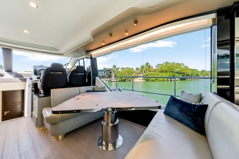  Yacht Photos Pics Luxurious interior of 2020 Azimut 60 Fly yacht with scenic water view.