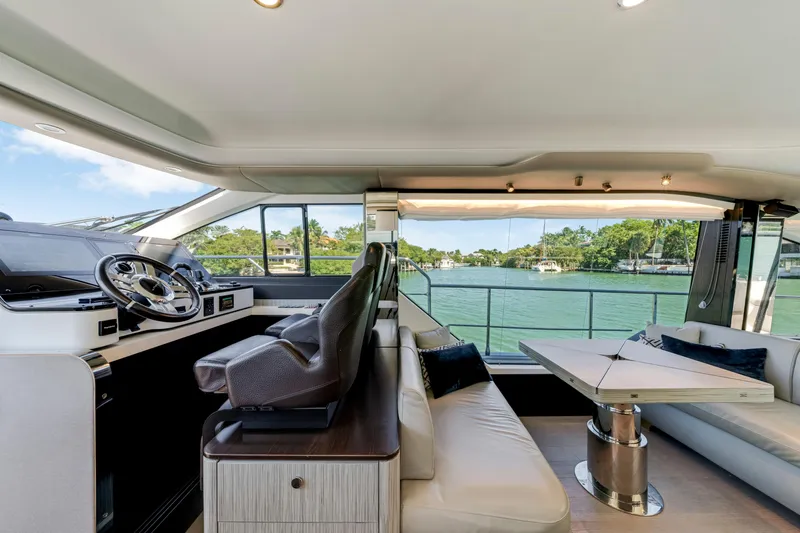 Yacht Photos Pics Luxurious interior of 2020 Azimut 60 Fly yacht with scenic water view.