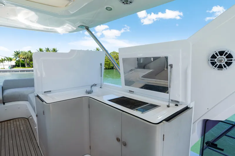  Yacht Photos Pics Luxurious Azimut 60 Fly 2020 yacht with sleek outdoor kitchen and scenic water view.