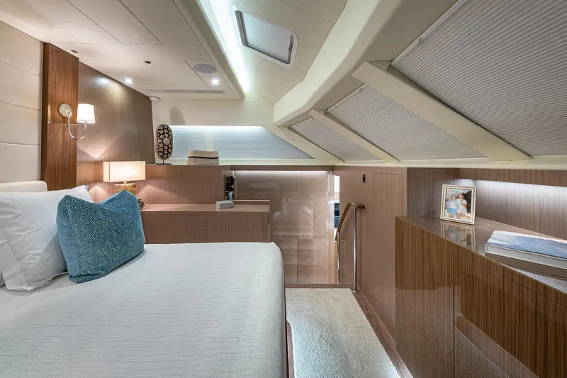 Oasis Yacht Photos Pics Luxurious 2023 Horizon PC60 yacht interior with elegant bedroom design and modern decor.