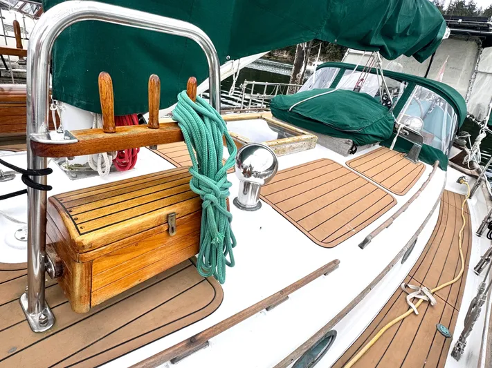 Yacht Photos Pics 1980 Hans Christian 38 MKII sailboat deck with green ropes and wooden accents.