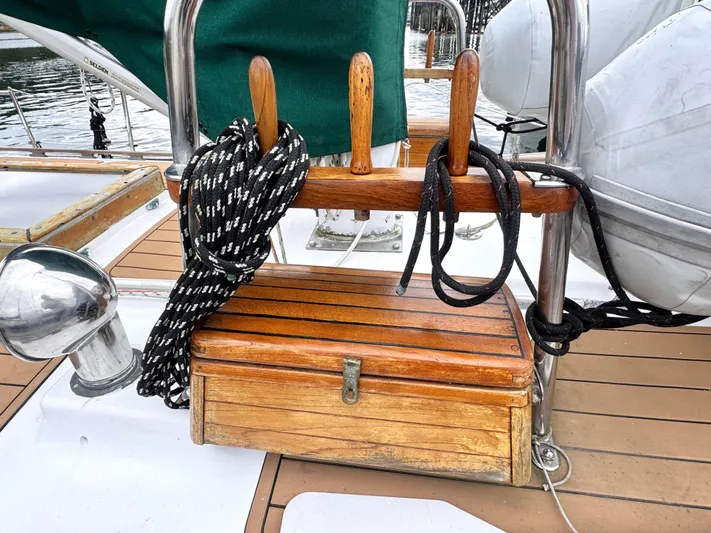  Yacht Photos Pics Wooden deck of 1980 Hans Christian 38 MKII sailboat with ropes and storage box.