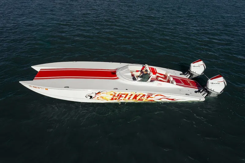  Yacht Photos Pics 2022 HellKats 32 speedboat with vibrant red accents on open water.