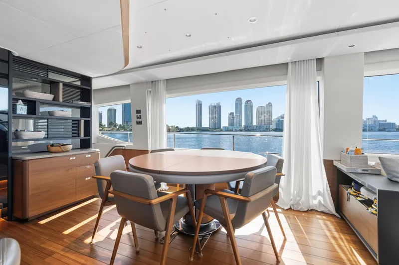  Yacht Photos Pics Luxurious interior of 2022 Princess Y85 yacht with city skyline view.