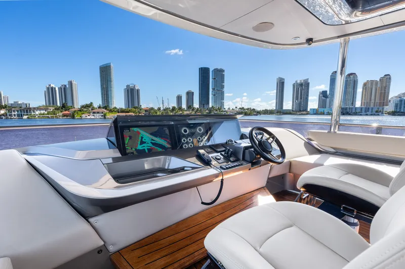 Yacht Photos Pics Luxurious 2022 Princess Y85 yacht interior with city skyline view.