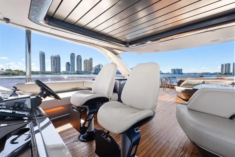  Yacht Photos Pics Luxurious 2022 Princess Y85 yacht interior with city skyline view.
