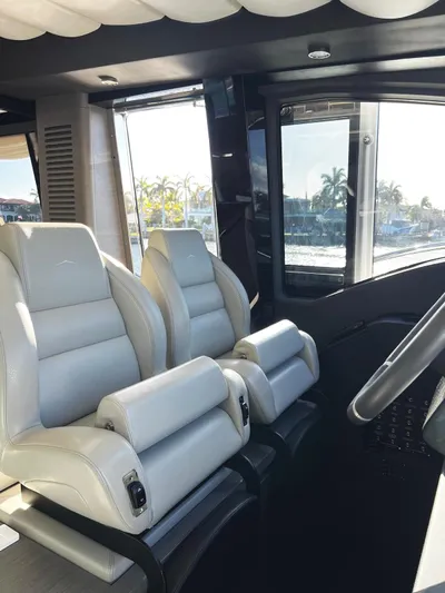 No Time To Die Yacht Photos Pics Interior of 2023 Azimut S8 yacht with luxurious white leather seats.