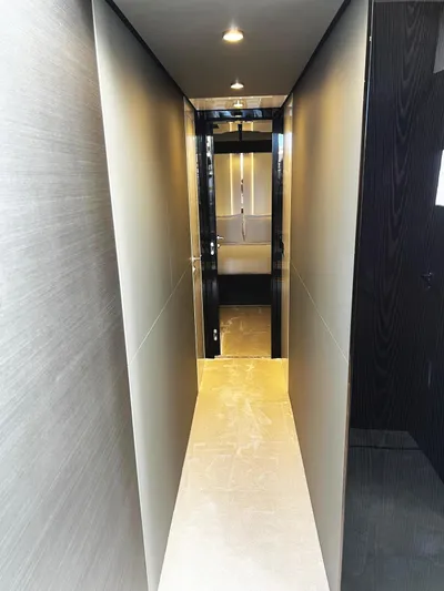 No Time To Die Yacht Photos Pics 2023 Azimut S8 yacht interior hallway with modern lighting and sleek design.