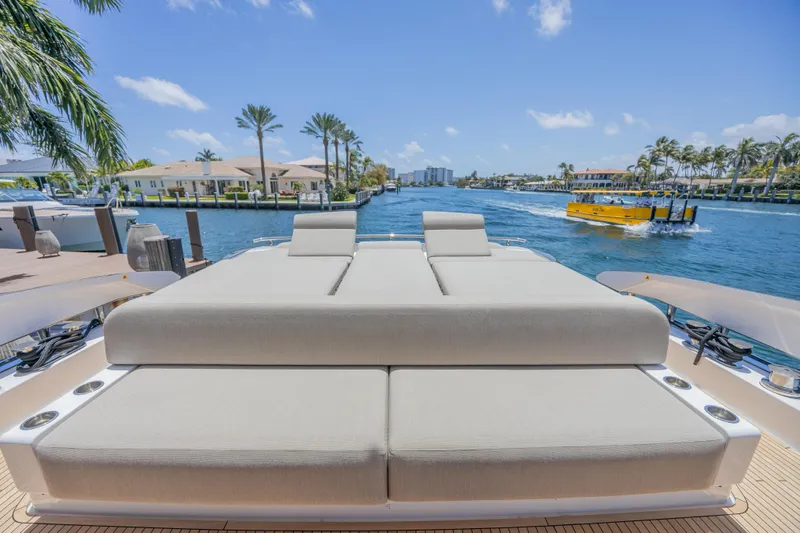 No Time To Die Yacht Photos Pics Luxurious 2023 Azimut S8 yacht with spacious sunbathing deck on a sunny waterfront.