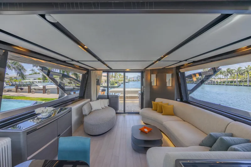 No Time To Die Yacht Photos Pics Luxurious interior of 2023 Azimut S8 yacht with modern furnishings and waterfront view.