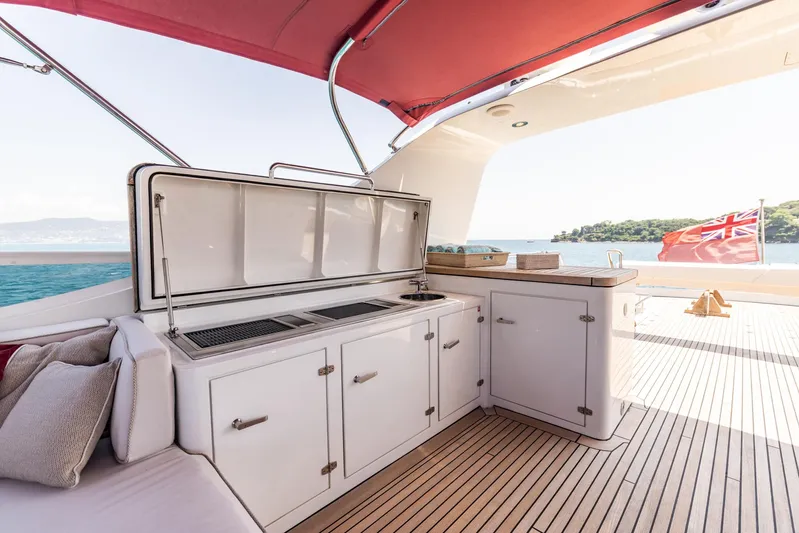 Jasmine Luna Yacht Photos Pics Luxurious 2007 Moonen JASMINE LUNA yacht deck with outdoor kitchen and scenic ocean view.