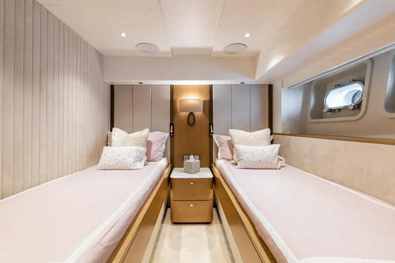Jasmine Luna Yacht Photos Pics Luxurious twin cabin interior on 2007 Moonen JASMINE LUNA yacht, featuring elegant bedding and decor.