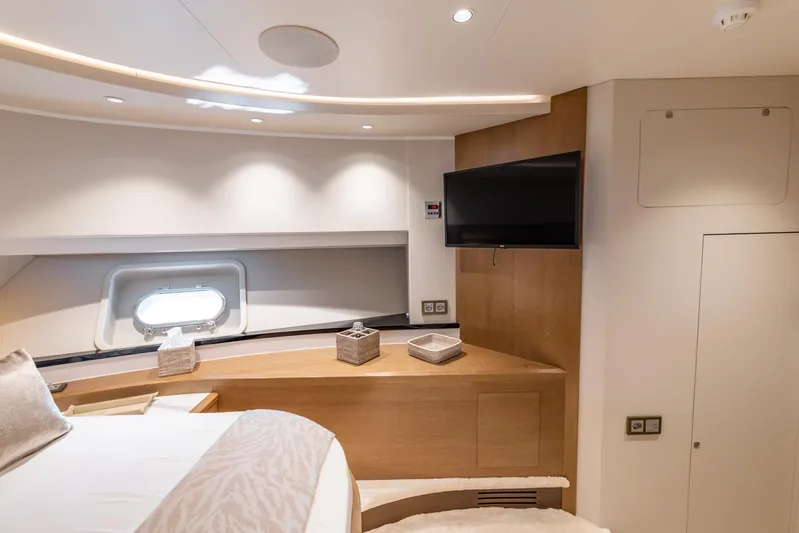 Jasmine Luna Yacht Photos Pics Luxurious cabin interior of 2007 Moonen JASMINE LUNA yacht with modern decor and TV.