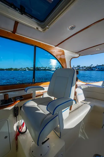 Niniane Yacht Photos Pics Interior of 2016 Hinckley Talaria 34 yacht with luxurious seating and scenic water view.