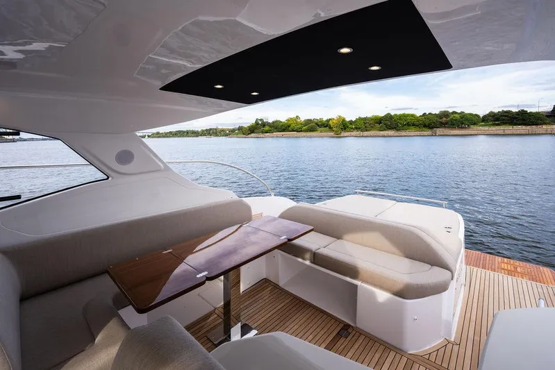  Yacht Photos Pics Luxurious 2025 Azimut Atlantis 45 yacht interior with elegant seating and scenic water view.