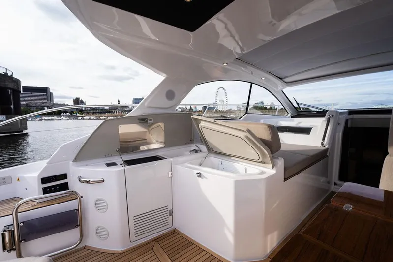  Yacht Photos Pics Luxurious 2025 Azimut Atlantis 45 yacht interior with modern seating and waterfront view.