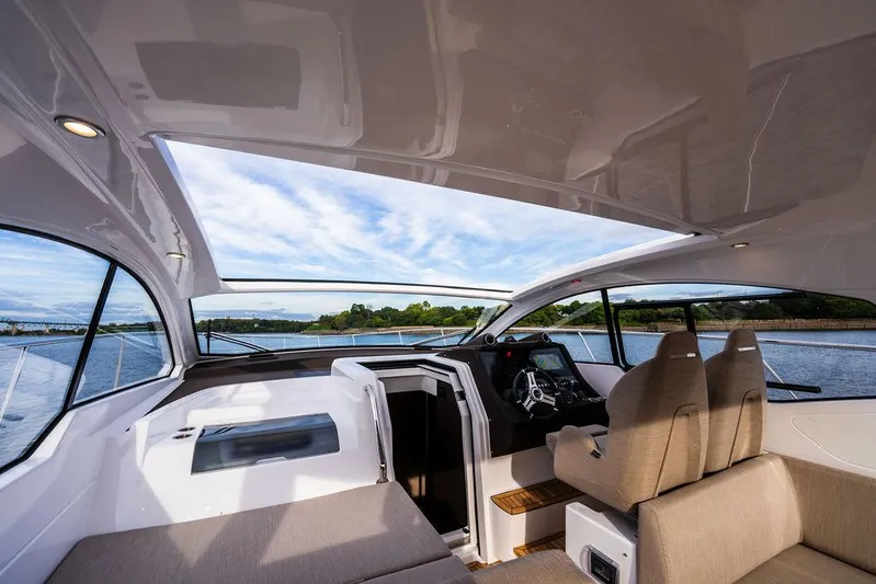  Yacht Photos Pics Interior view of 2025 Azimut Atlantis 45 yacht, featuring modern design and spacious seating.