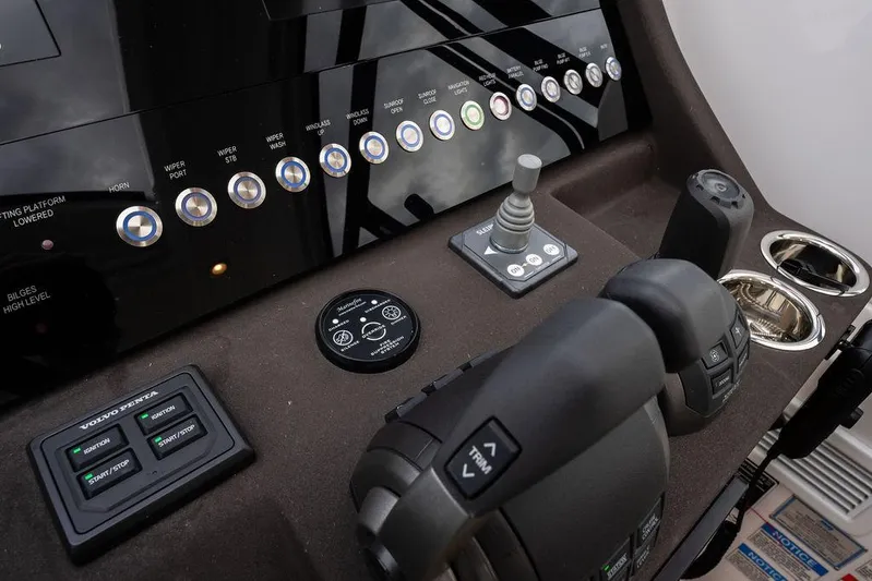  Yacht Photos Pics Control panel of 2025 Azimut Atlantis 45 yacht with joystick and throttle controls.