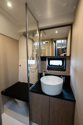  Yacht Photos Pics Modern bathroom interior of 2025 Azimut Atlantis 45 yacht with sleek design.