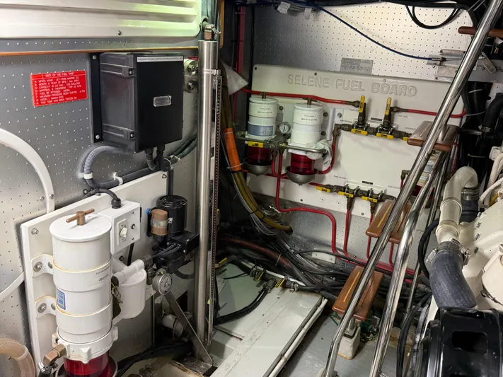Marco Polo Yacht Photos Pics Engine room of 2004 Selene Pilothouse with fuel board and filtration system.