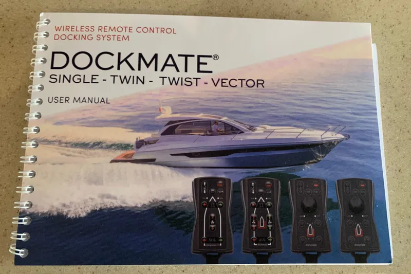 Marco Polo Yacht Photos Pics User manual cover for Dockmate wireless remote control docking system, featuring a luxury yacht.