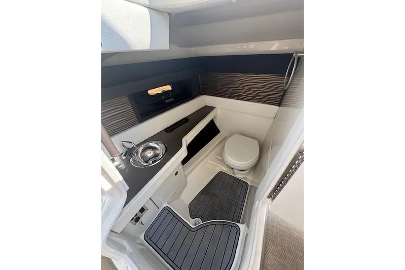  Yacht Photos Pics 2017 Sea Ray SLX 310 Outboard boat interior with sink and toilet.