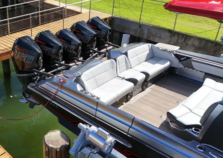  Yacht Photos Pics 2022 Nor-Tech 50 Sport boat with quad Mercury 450R engines, docked with luxurious seating.