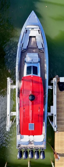  Yacht Photos Pics Overhead view of 2022 Nor-Tech 50 Sport boat with red canopy and four engines.