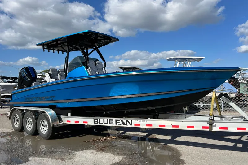  Yacht Photos Pics 2025 Concept 27' Open Deck boat on trailer under blue sky.