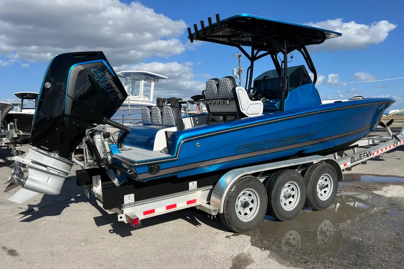  Yacht Photos Pics 2025 Concept 27' Open Deck boat on trailer, featuring powerful outboard motor.