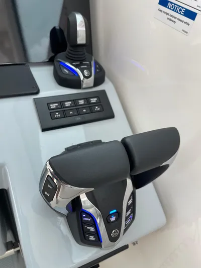  Yacht Photos Pics 2024 Pursuit DC 326 Dual Console boat controls with joystick and throttle levers.