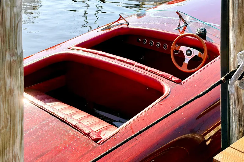  Yacht Photos Pics Custom 1998 30 Gentleman's Racer boat with red interior and wooden steering wheel.