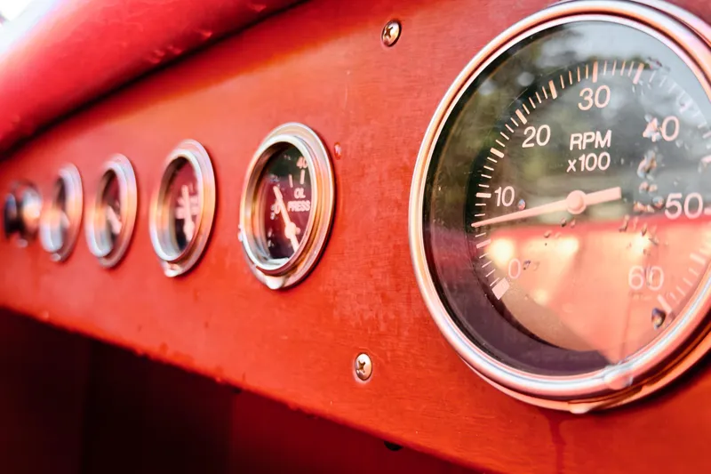  Yacht Photos Pics Dashboard of 1998 Custom 30 Gentleman's Racer with RPM and oil pressure gauges.