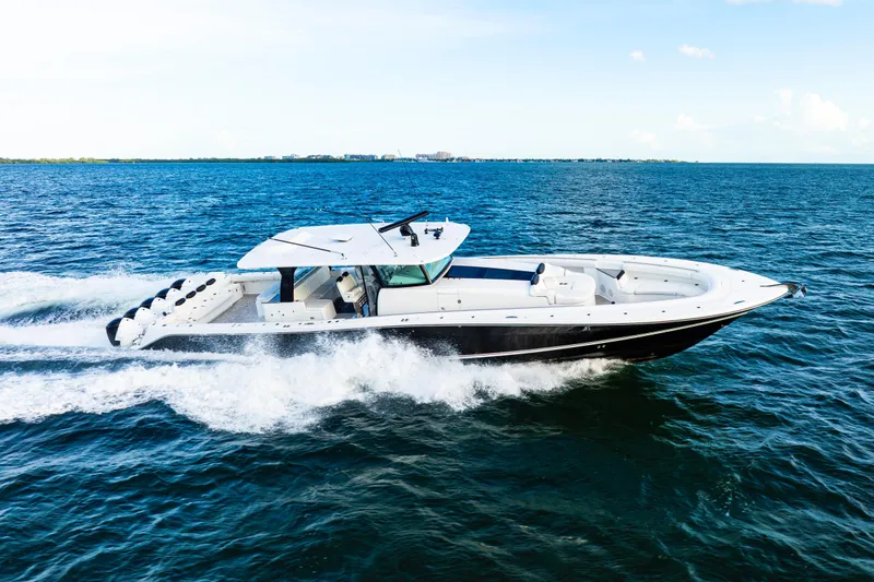  Yacht Photos Pics 2021 HCB 65 Estrella luxury boat cruising on open water.